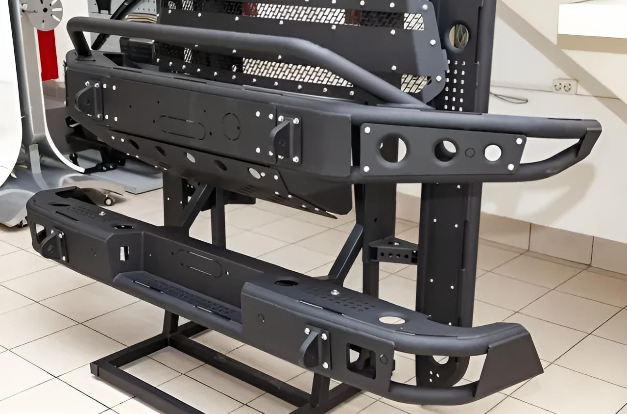Black Metal Off-road Bumpers Displayed on a Stand in a Workshop — GZM 4x4 Performance In Ballina, NSW