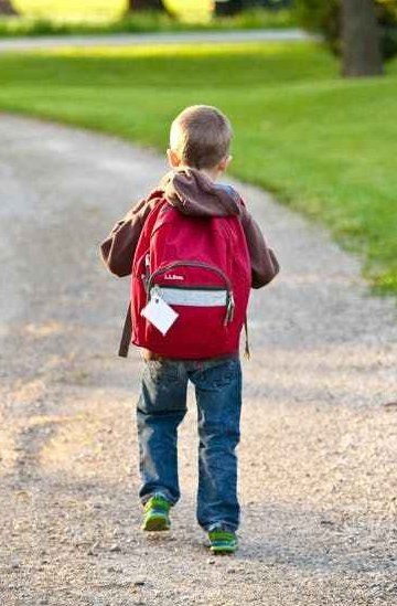 Kid with Back Pack — St. Cloud, MN — Minser Chiropractic Clinic