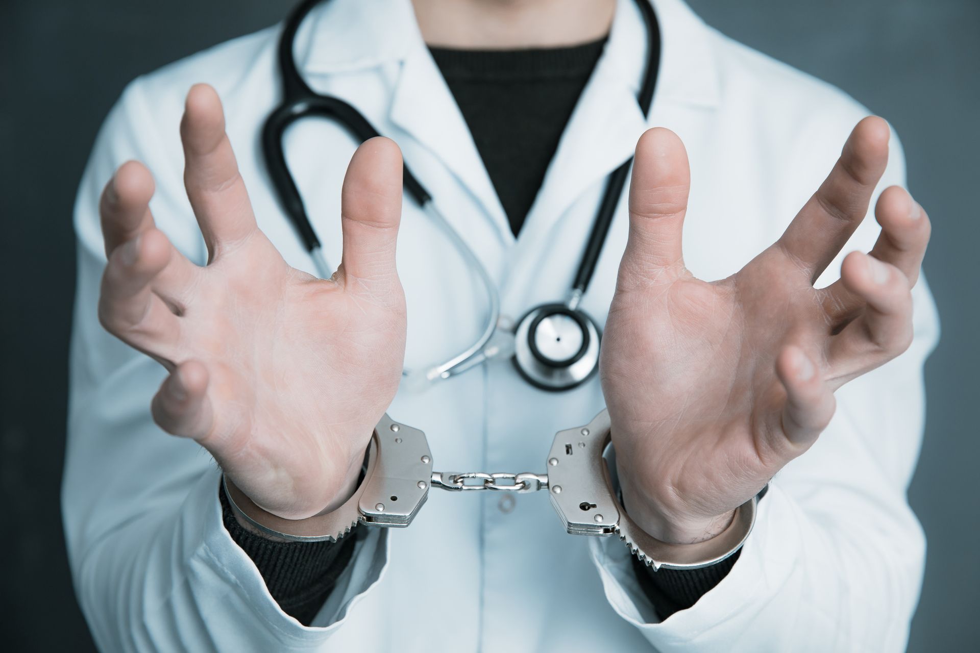 Doctor Hand Handcuffs | Cape Elizabeth, ME | The Vachon Agency