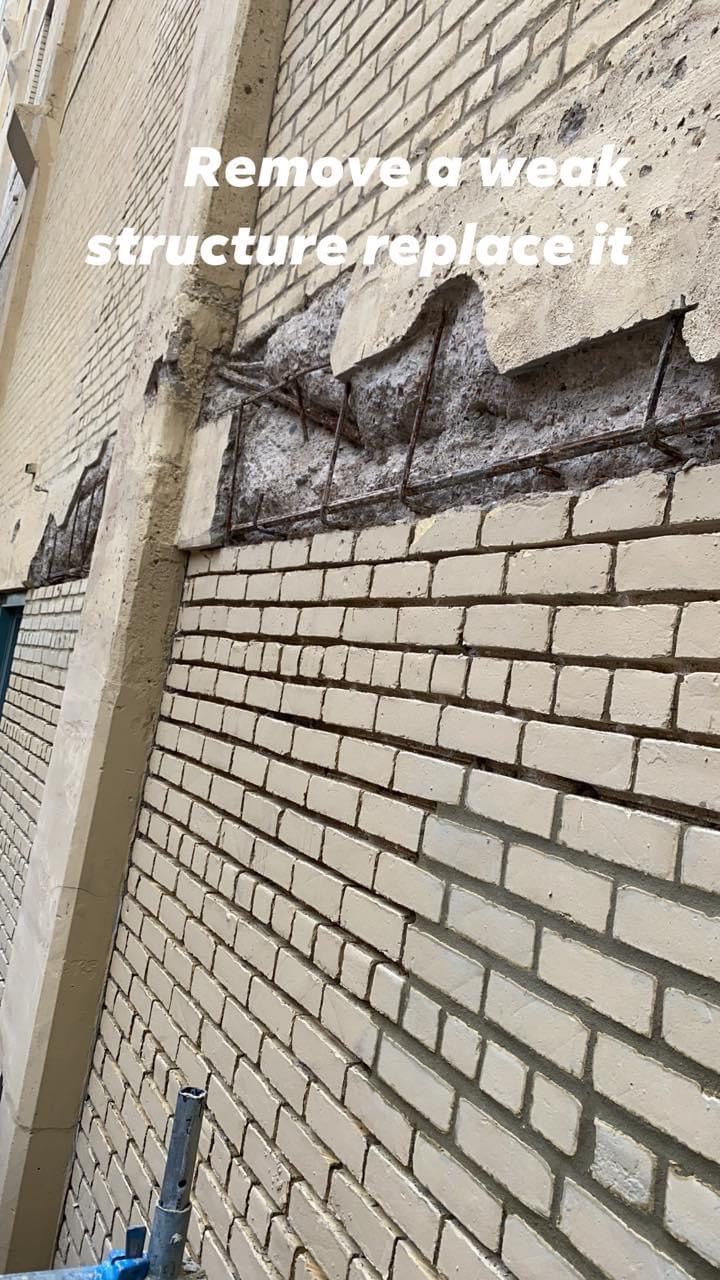 A close up of a brick wall with the words `` remove a weak structure replace it '' written on it.