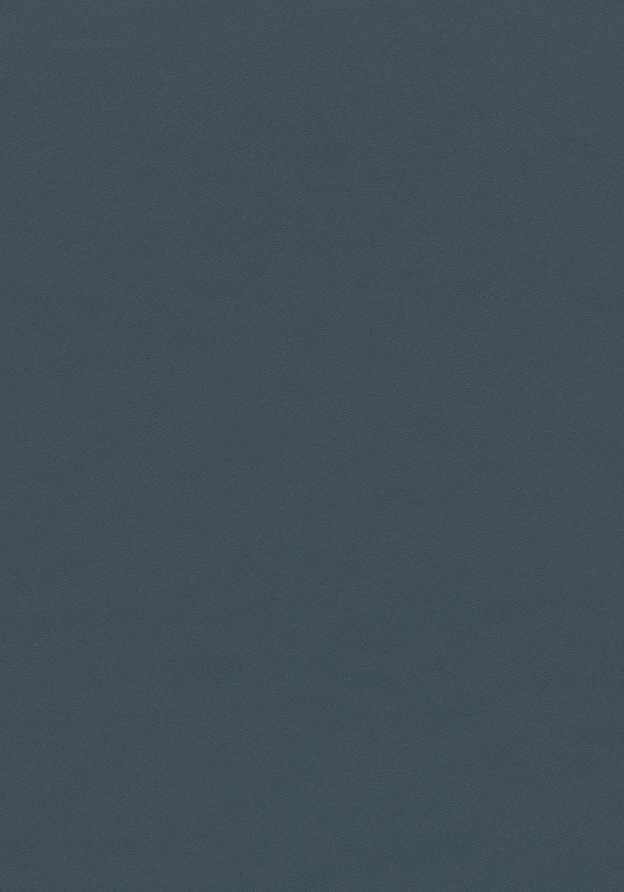 Et nærbillede af en blå papirtekstur.