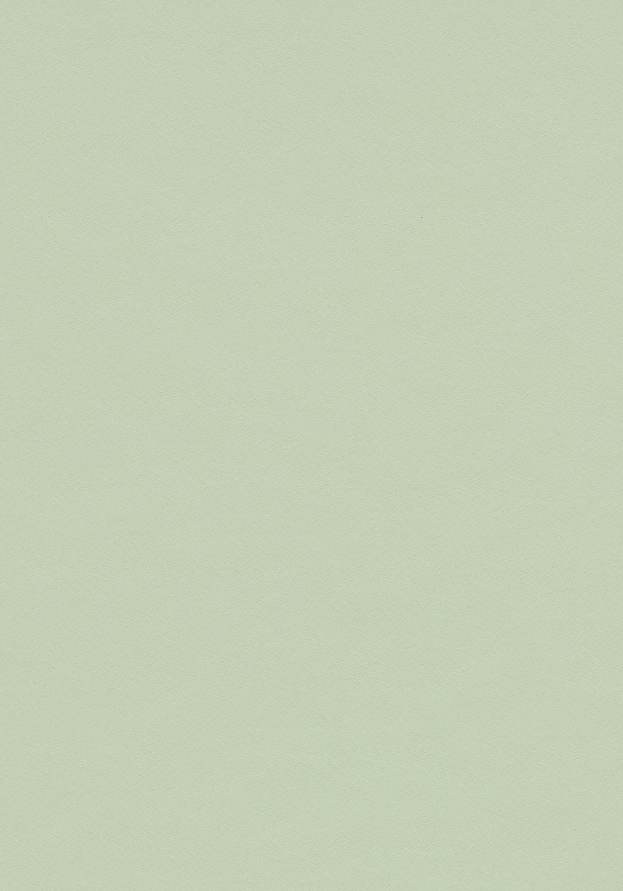 Et nærbillede af en lysegrøn papirtekstur.