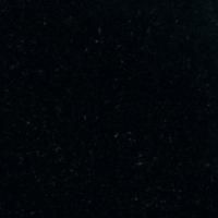 Et nærbillede af en sort overflade med hvide prikker på.