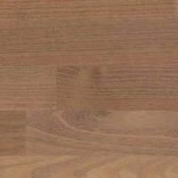 Et nærbillede af et stykke træ, der viser årer og tekstur.