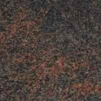 Et nærbillede af en bordplade af brun granit.