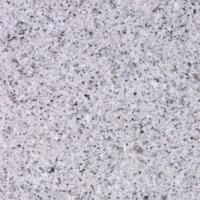 Et nærbillede af en hvid granit bordplade.