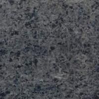 Et nærbillede af en sort granit bordplade.