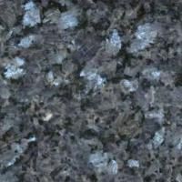 Et nærbillede af en granitbordplade med en masse små sten på.