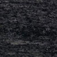 Et nærbillede af en sort granit bordplade.