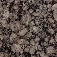 Et nærbillede af en granitbordplade med en masse små sten.