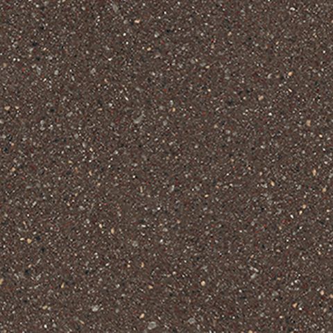 Et nærbillede af en bordplade i brun granit med små sten.