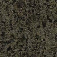 Et nærbillede af en grøn granit bordplade.