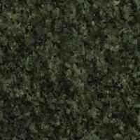 Et nærbillede af en grøn granit bordplade.