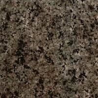 Et nærbillede af en bordplade af brun granit.