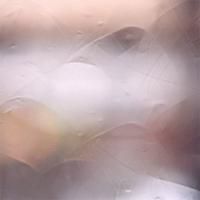 Et nærbillede af en marmortekstur med en sløret baggrund.