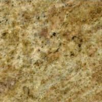 Et nærbillede af en gul granit bordplade.