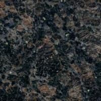 Et nærbillede af en sort granit bordplade.