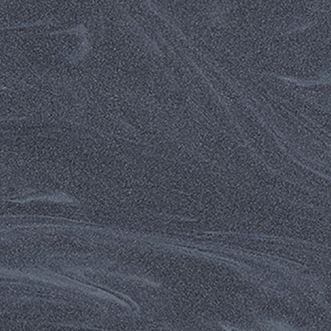 Et nærbillede af en grå overflade med en kornet tekstur.