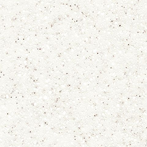 Et nærbillede af en hvid overflade med små sorte prikker på.