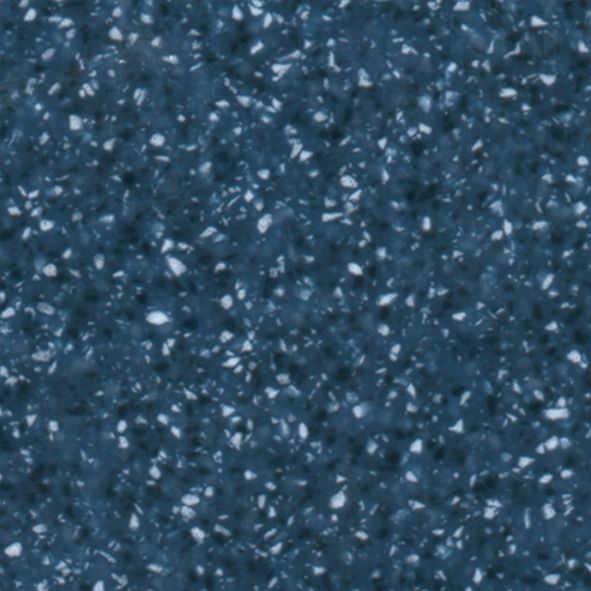 Et nærbillede af en blå overflade med hvide pletter