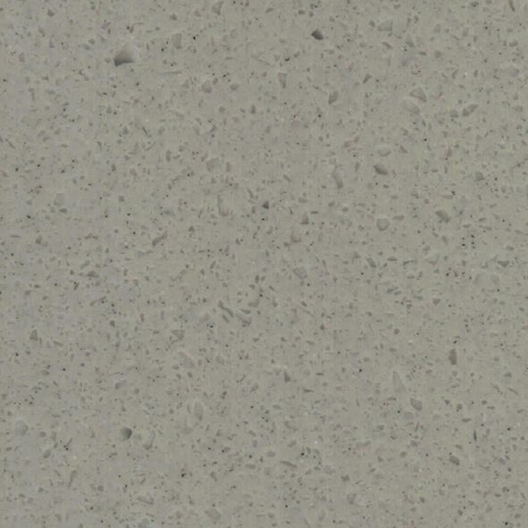 Et nærbillede af en hvid overflade med små prikker på.