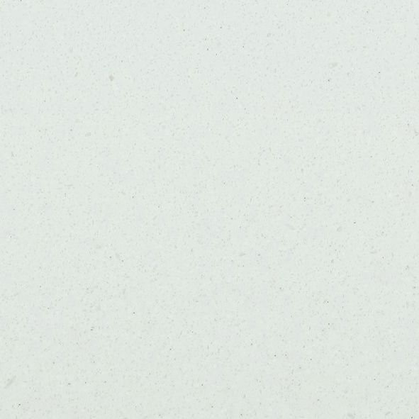 Et nærbillede af en hvid overflade med en kornet tekstur.