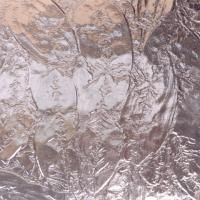 Et nærbillede af et stykke aluminiumsfolie.