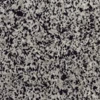 Et nærbillede af en sort og hvid granit tekstur.