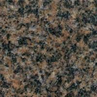 Et nærbillede af en bordplade af brun granit.