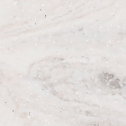 Et nærbillede af en hvid granitbordplade med marmortekstur.