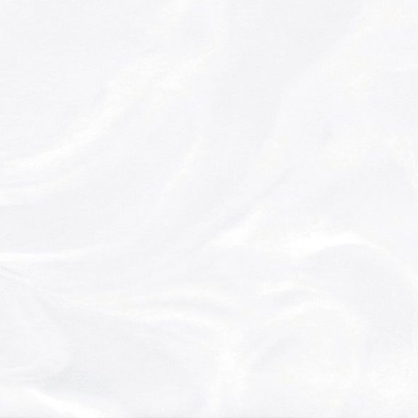 Et nærbillede af et stykke hvidt papir på en hvid baggrund.