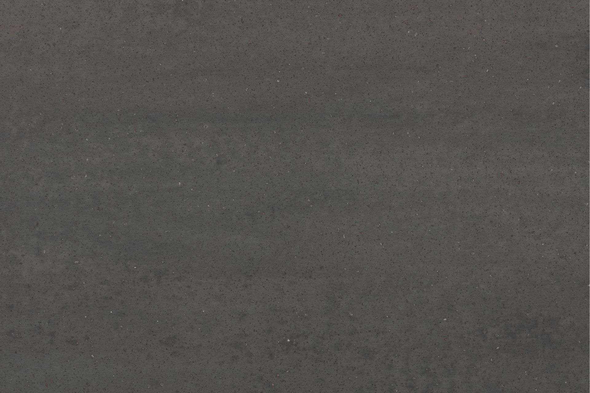 Et nærbillede af en grå betonoverflade.