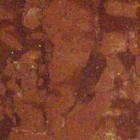 Et nærbillede af en rød marmor tekstur.