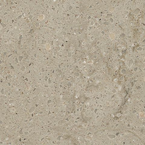 Et nærbillede af en bordplade i beige granit.