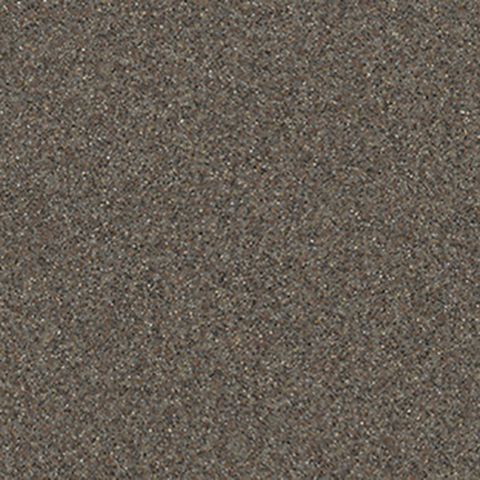 Et nærbillede af et brunt tæppe med en kornet tekstur