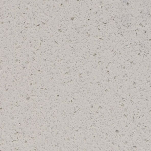 Et nærbillede af en hvid overflade med små prikker på.