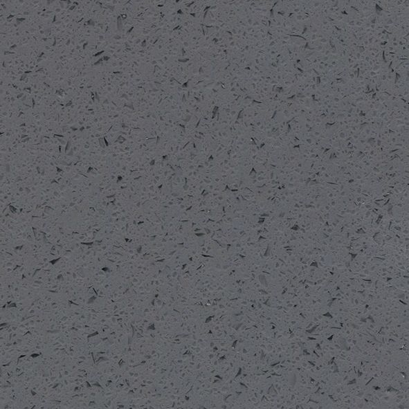 Et nærbillede af en grå overflade med små prikker på.