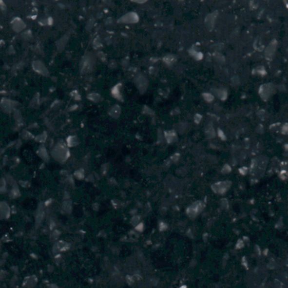 Et nærbillede af en sort granit bordplade