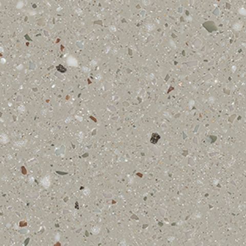 Et nærbillede af en flise med en masse små sten på.