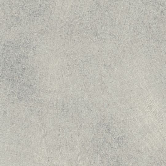 Et nærbillede af en grå betonoverflade.