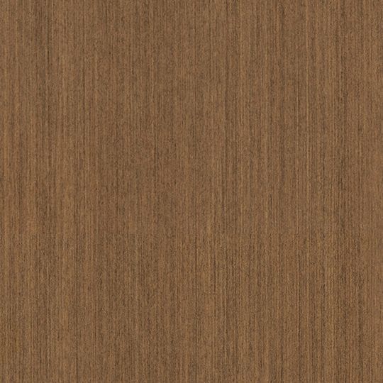 Et nærbillede af et stykke træ, der viser træets struktur.