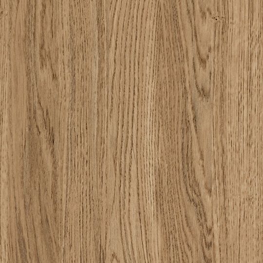 Et nærbillede af et stykke træ, der viser årer og tekstur.