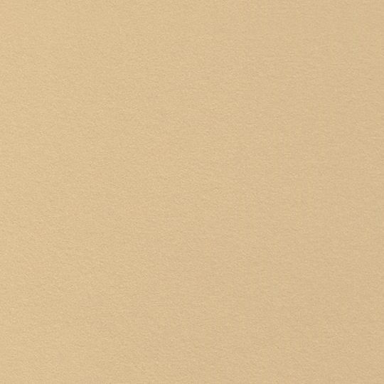 Et nærbillede af et stykke beige papir.