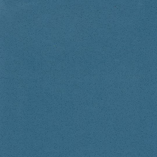 Et nærbillede af en blå papirtekstur.