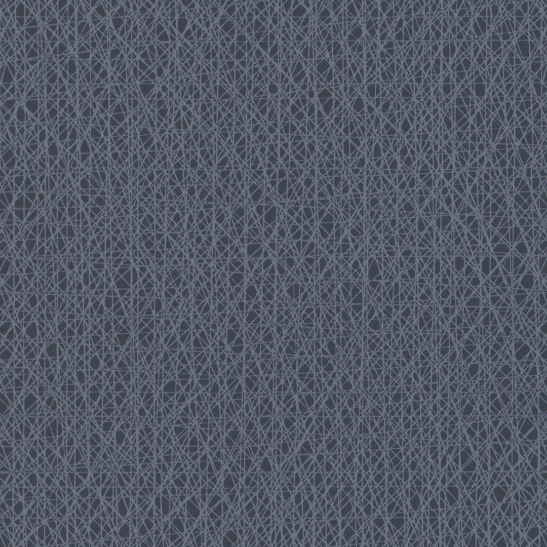 Et nærbillede af et blåt stof med et mønster på.