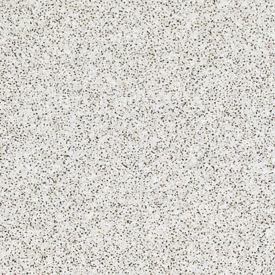 Et nærbillede af et hvidt tæppe med en grå tekstur