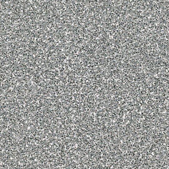 Et nærbillede af en grå tæppetekstur.