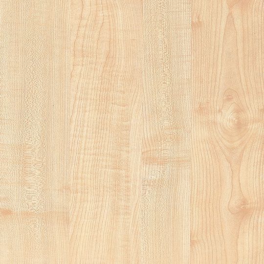 Et nærbillede af et stykke træ, der viser træets årer.