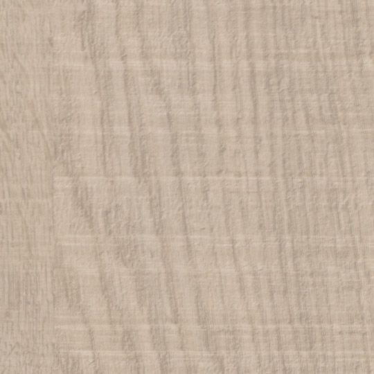 Et nærbillede af et stykke stof, der ligner træ.