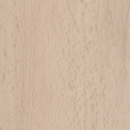 Et nærbillede af et stykke træ, der viser træets struktur.